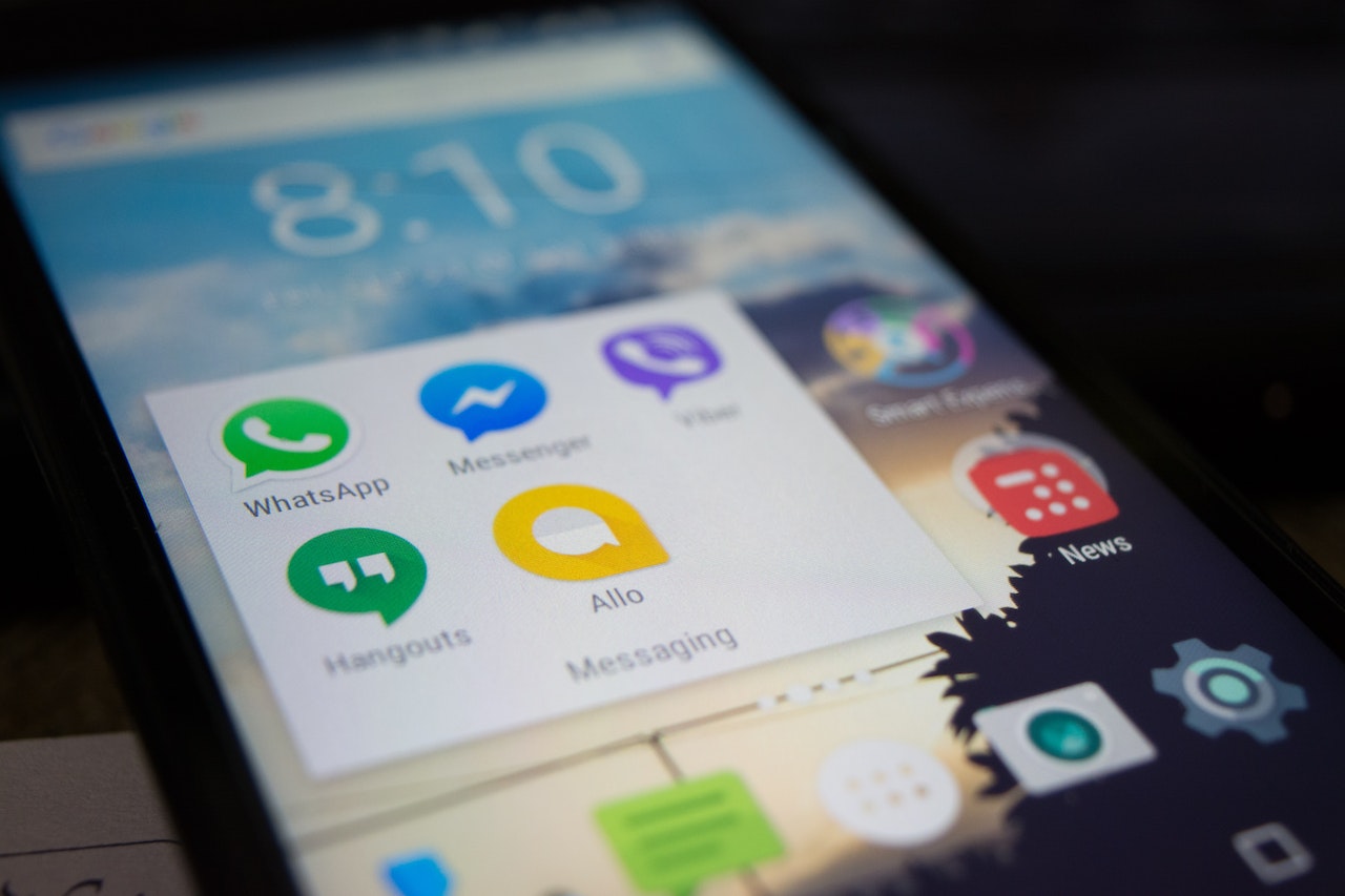 Social media apps are in the folder of a smartphone